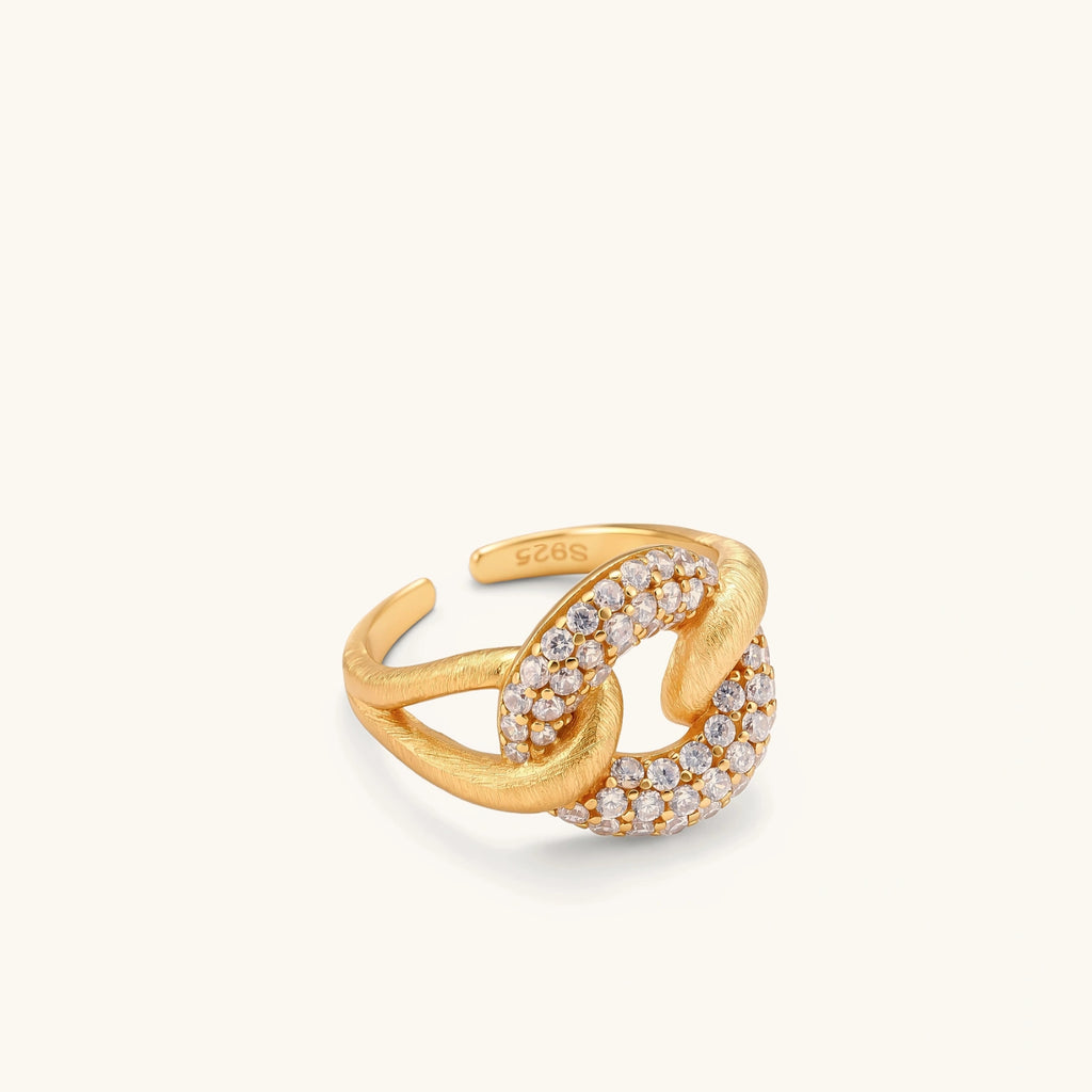 Adjustable 18K gold-plated open cuff ring with interlocking chain links, one brushed gold, one pavé-set cubic zirconia. S925 stamped.